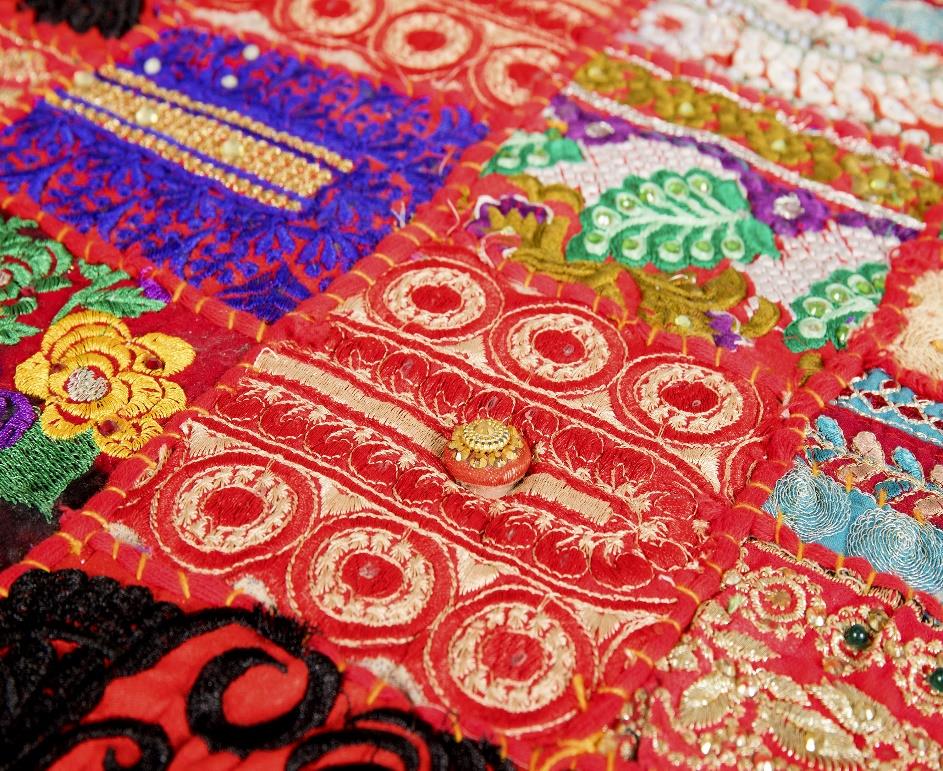 Rich red handcrafted patchwork placemats for festive and holiday table styling