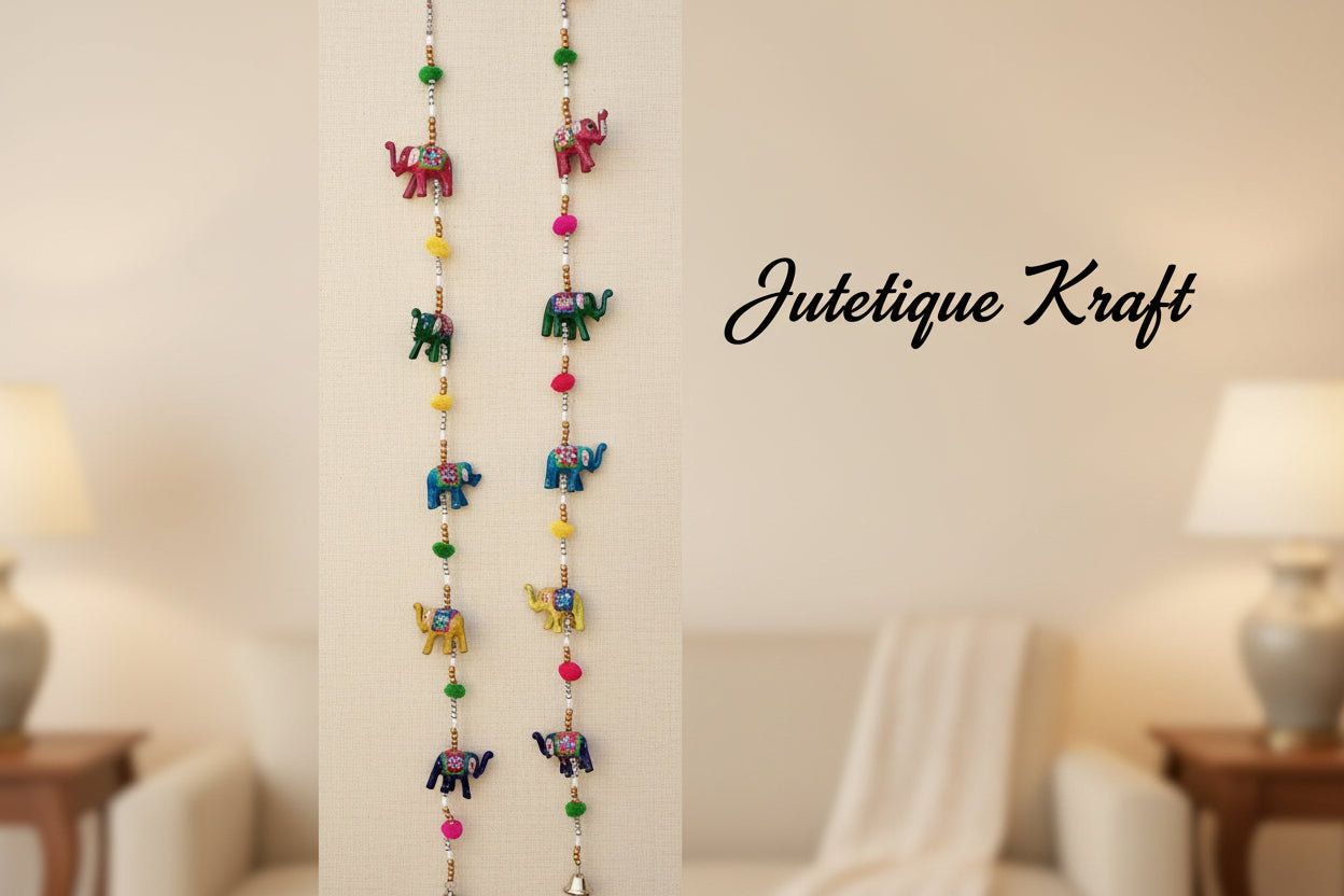 Decorative string with colorful beads and small elephant figurines on a white background