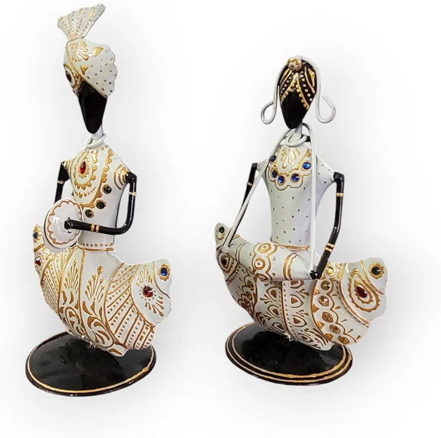 Decorative figurines with intricate designs on a white background