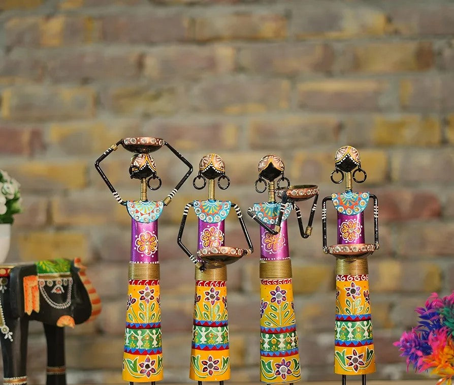 Colorful decorative sticks with floral patterns against a brick wall background