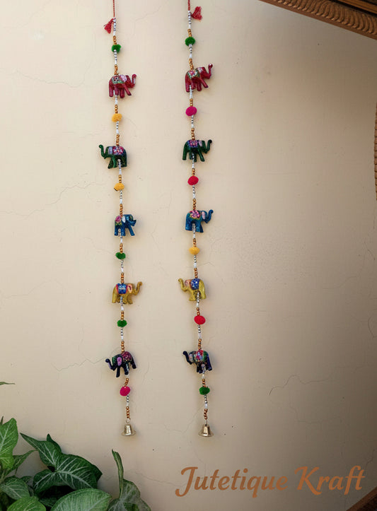 Decorative string with small colorful elephant figures on a white background for door