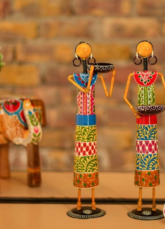 Colorful decorative figurines with intricate patterns on a blurred background