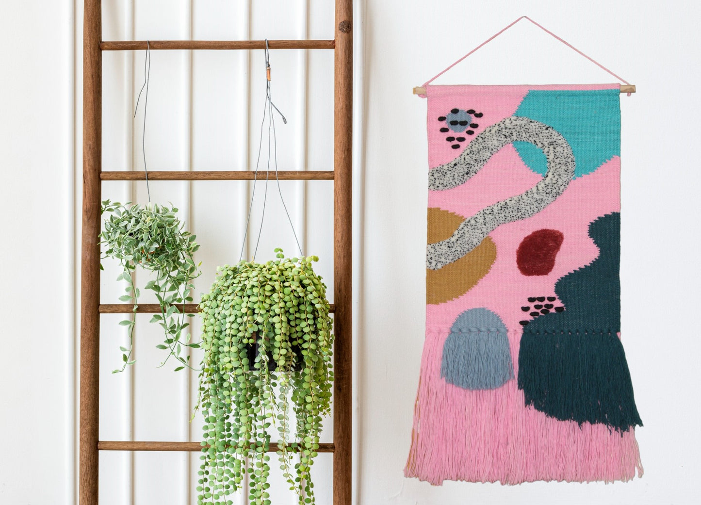 Handmade Woolen Wall Decor by Jutetique – 18-Inch Wide Small Fringe Tapestry