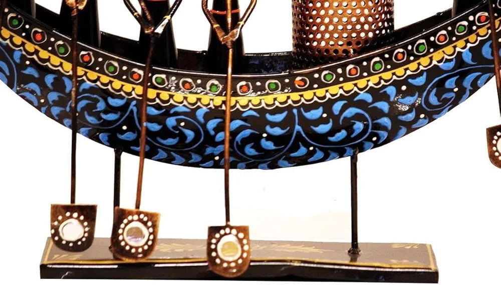Handcrafted metal boat pen stand in black with traditional Shisha mirror work detailing