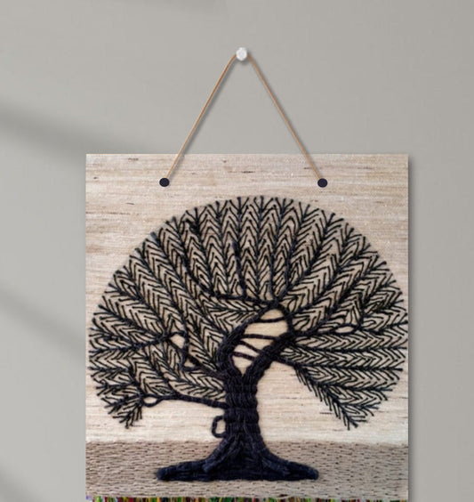 30 inch GI Tagged Jute Handwoven Tree of Life Tapestry with a wooden hanging rod styled as a bohemian rustic wall accent by Jutetique Kraft.