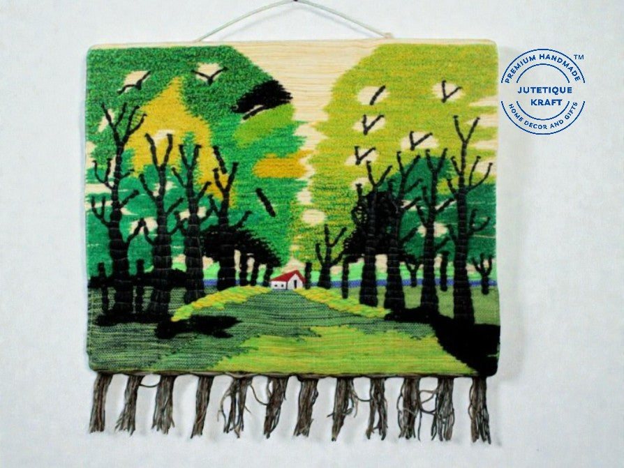 GI Tagged Green Woolen Wall Hanging featuring a handwoven forest landscape design by Jutetique Kraft