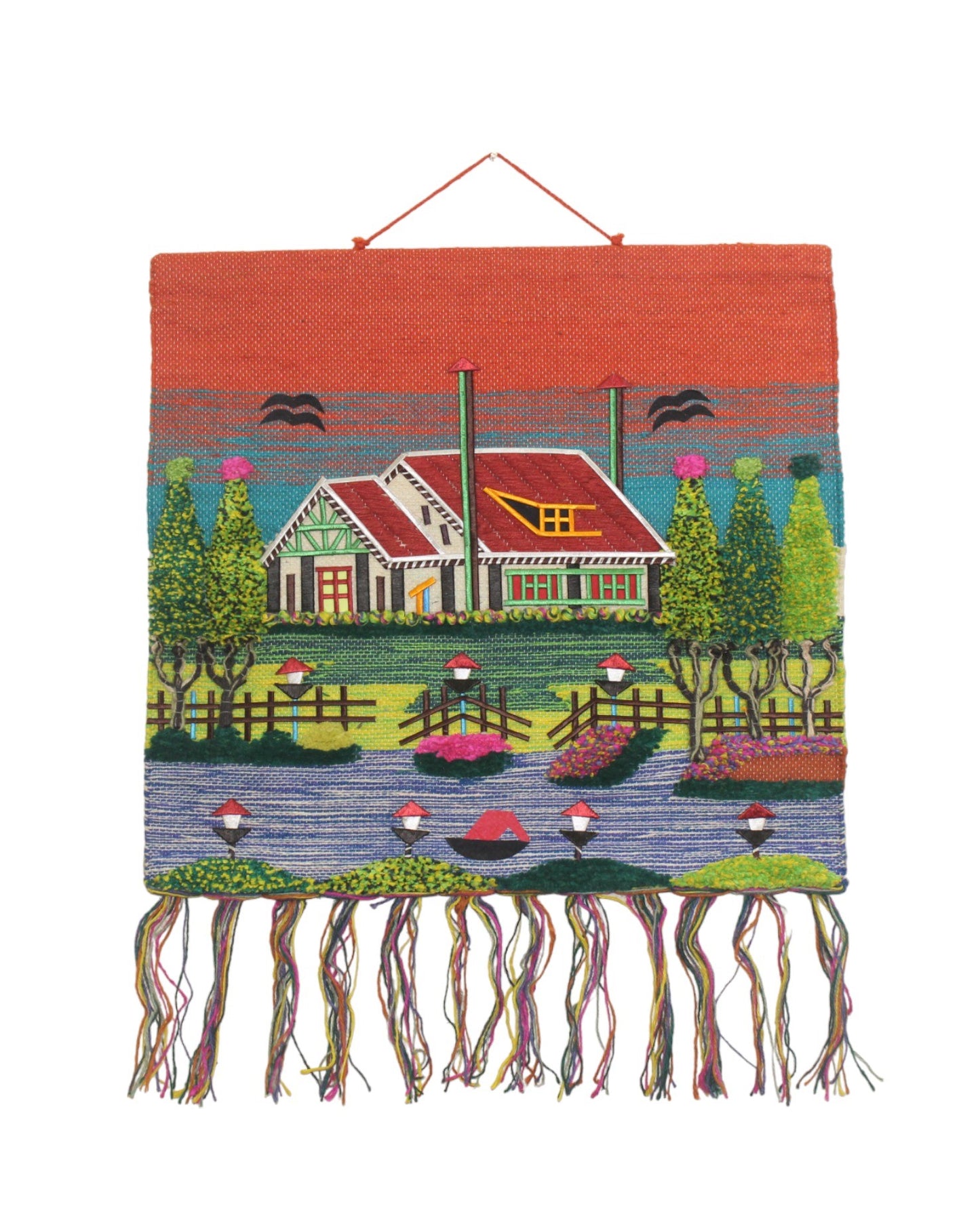 GI Tagged Jute Handwoven Wallhanging featuring a traditional village landscape scene with boats under an orange sunset sky