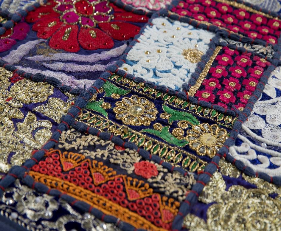 Modern blue handcrafted patchwork table runner with rich contrasting textile art