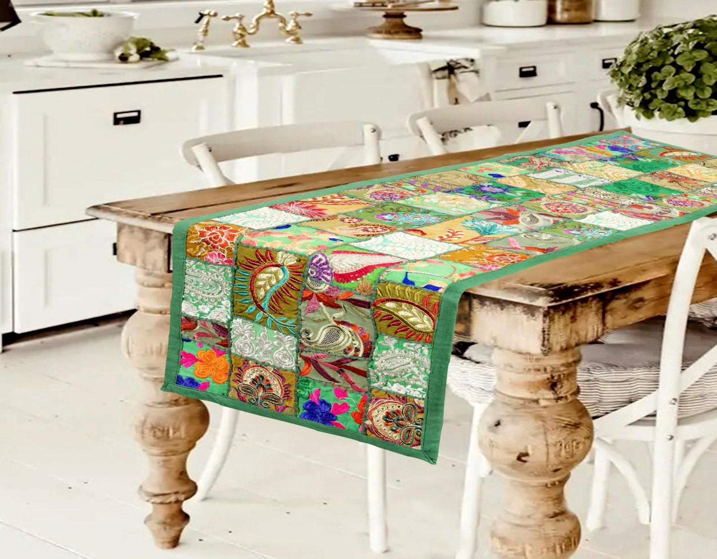 Vibrant handcrafted green patchwork table runner with bohemian textile patterns
