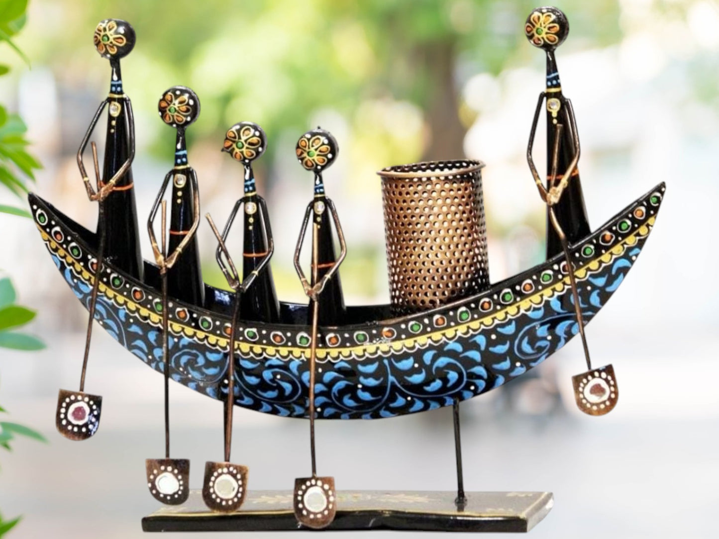 Handcrafted metal boat pen stand in black with traditional Shisha mirror work detailing