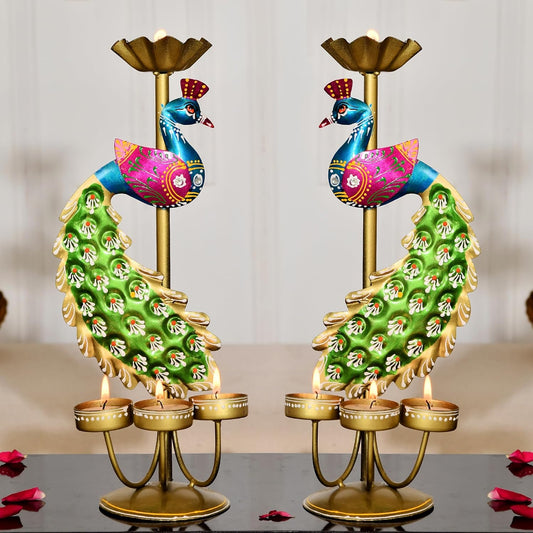 Pair of handcrafted colorful peacock-shaped metal candle holders from The Shriya Collection