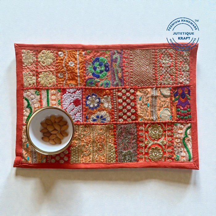 Festive orange handcrafted patchwork dining mats set for home decoration