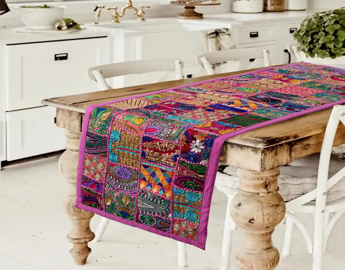 Handcrafted pink patchwork table runner with traditional block print textures