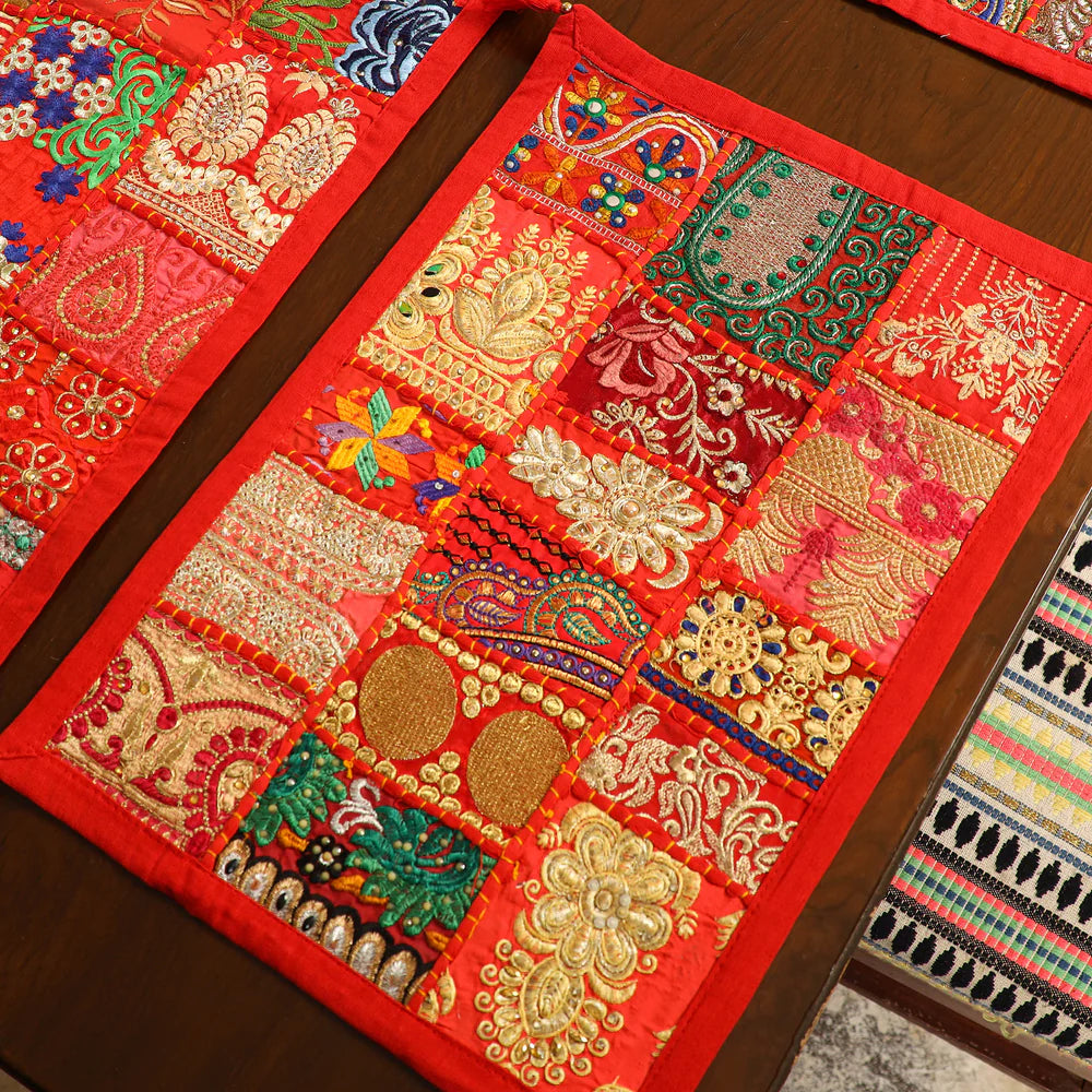 Festive red handcrafted patchwork dining tablescape set by Jutetique Kraft