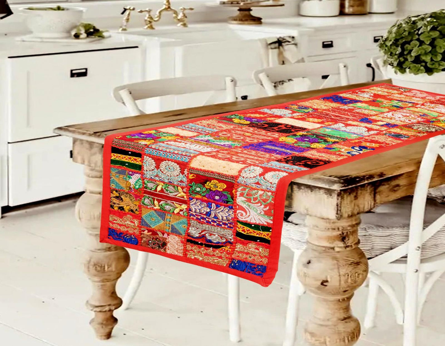 Vibrant handcrafted red patchwork table runner with bohemian textile patterns