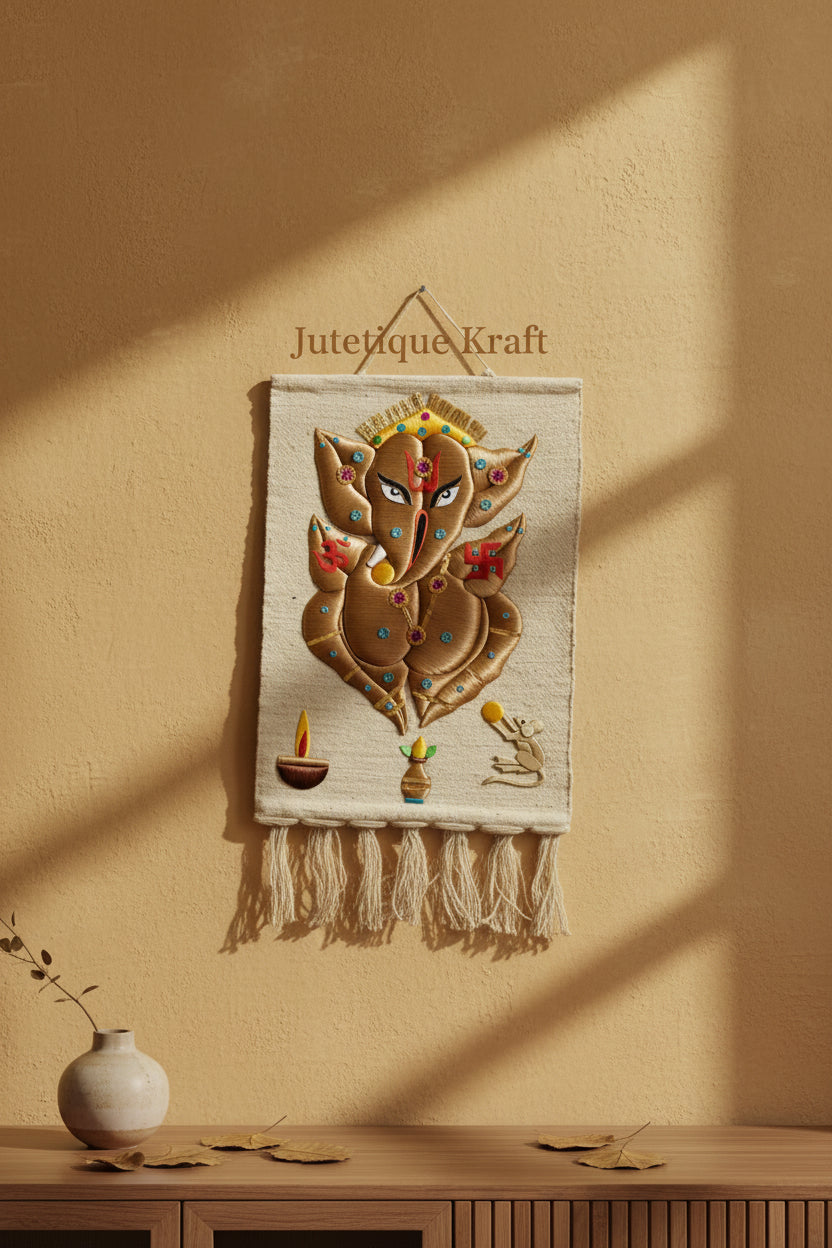 White Handmade Ganesh Ji Wall Hanging with intricate silk thread embroidery and tassels on a natural jute background