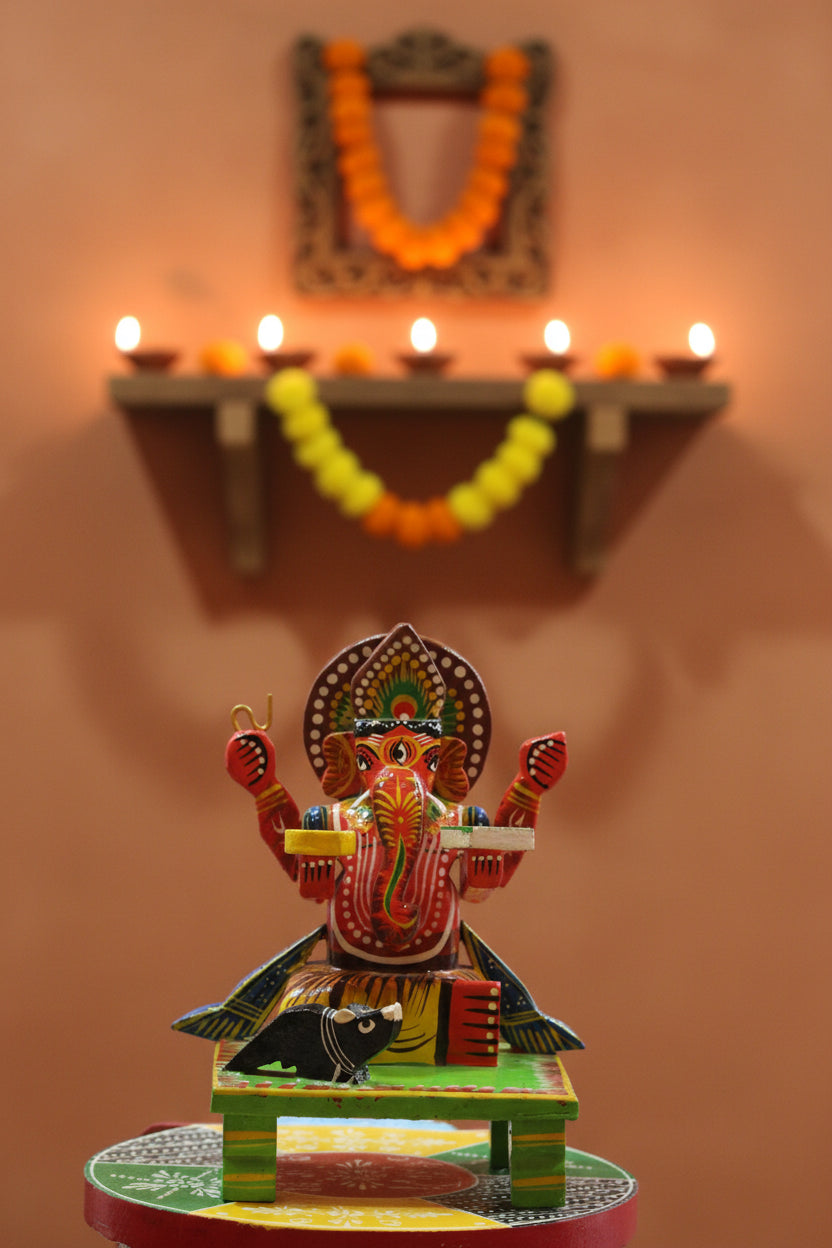 High-gloss friction-based lacquer finish details on the back of a handmade Kashi wooden Ganesha statue