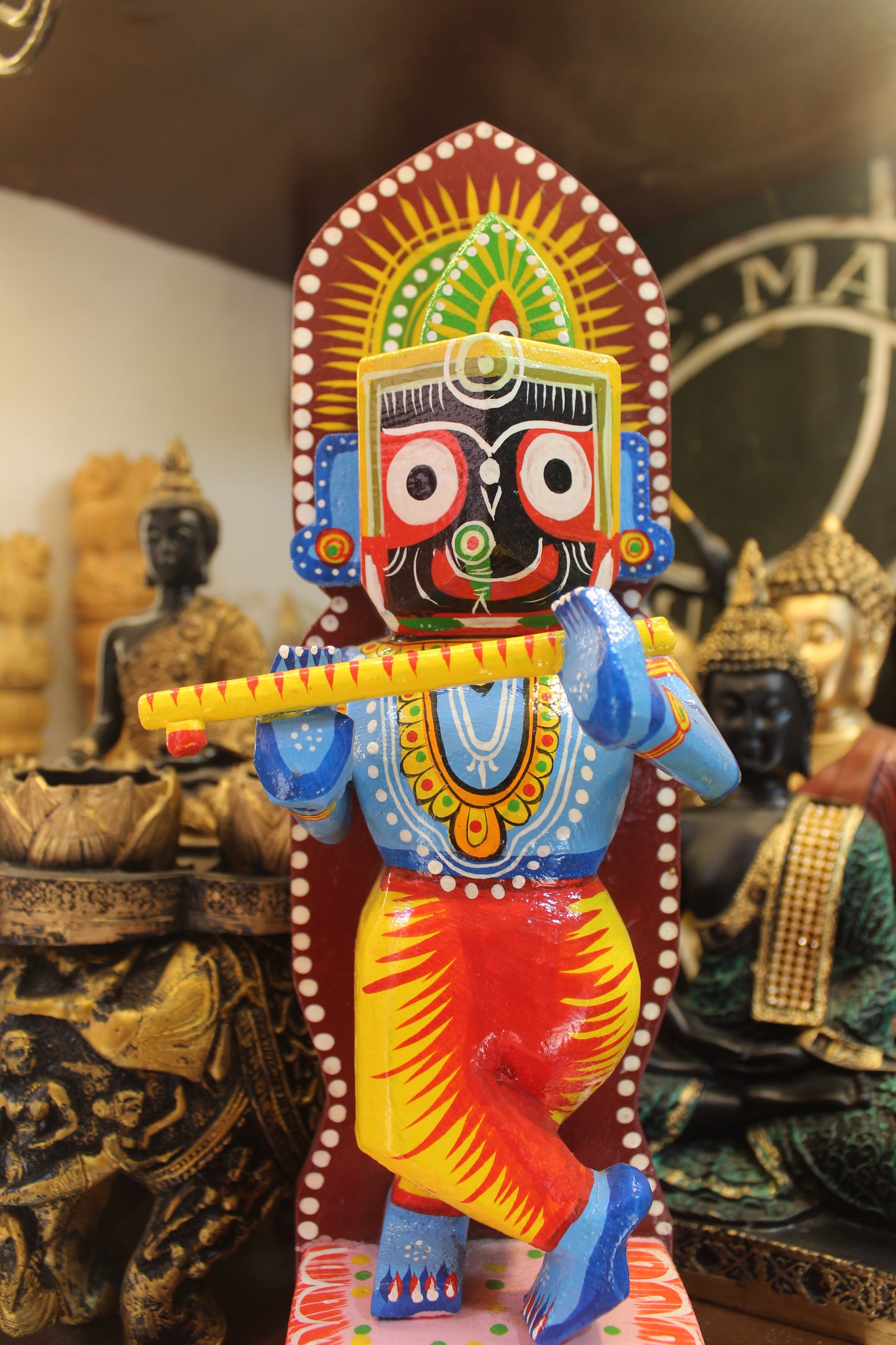 Medium 12-inch handcrafted Varanasi lacquerware Krishna statue with Jagannath face for living room display.