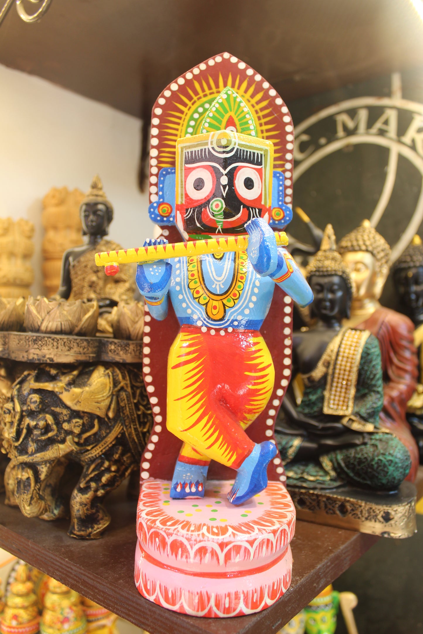 Medium 12-inch handcrafted Varanasi lacquerware Krishna statue with Jagannath face for living room display.