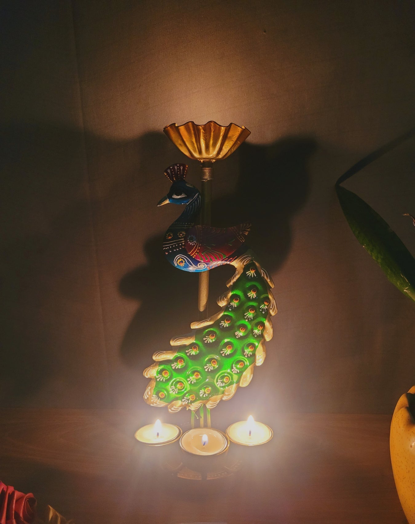 Majestic Glow: Handcrafted Metal Peacock Candle Stand (13 Inch)