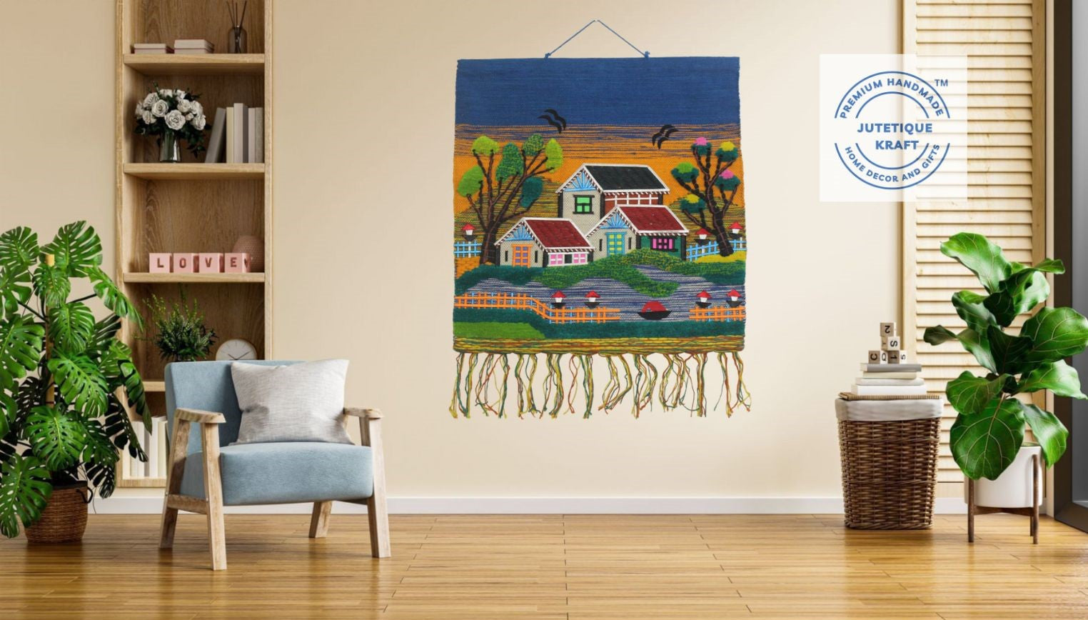 Square 30x30 traditional handwoven jute village scenery tapestry hanging as a statement art piece over a chair in a stylized living room setting