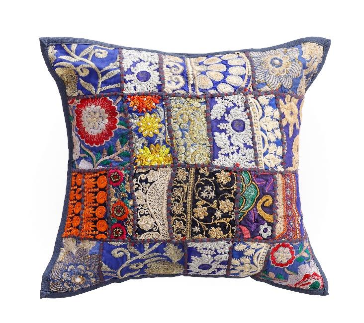Decorative pillow with colorful patchwork design on a white background