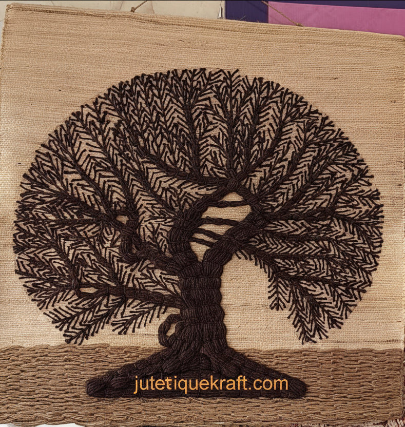 Earthy natural fiber spiritual wall hanging depicting a traditional handwoven tree of life landscape silhouette layout.